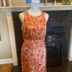 Dress sleeveless. Gold with orange